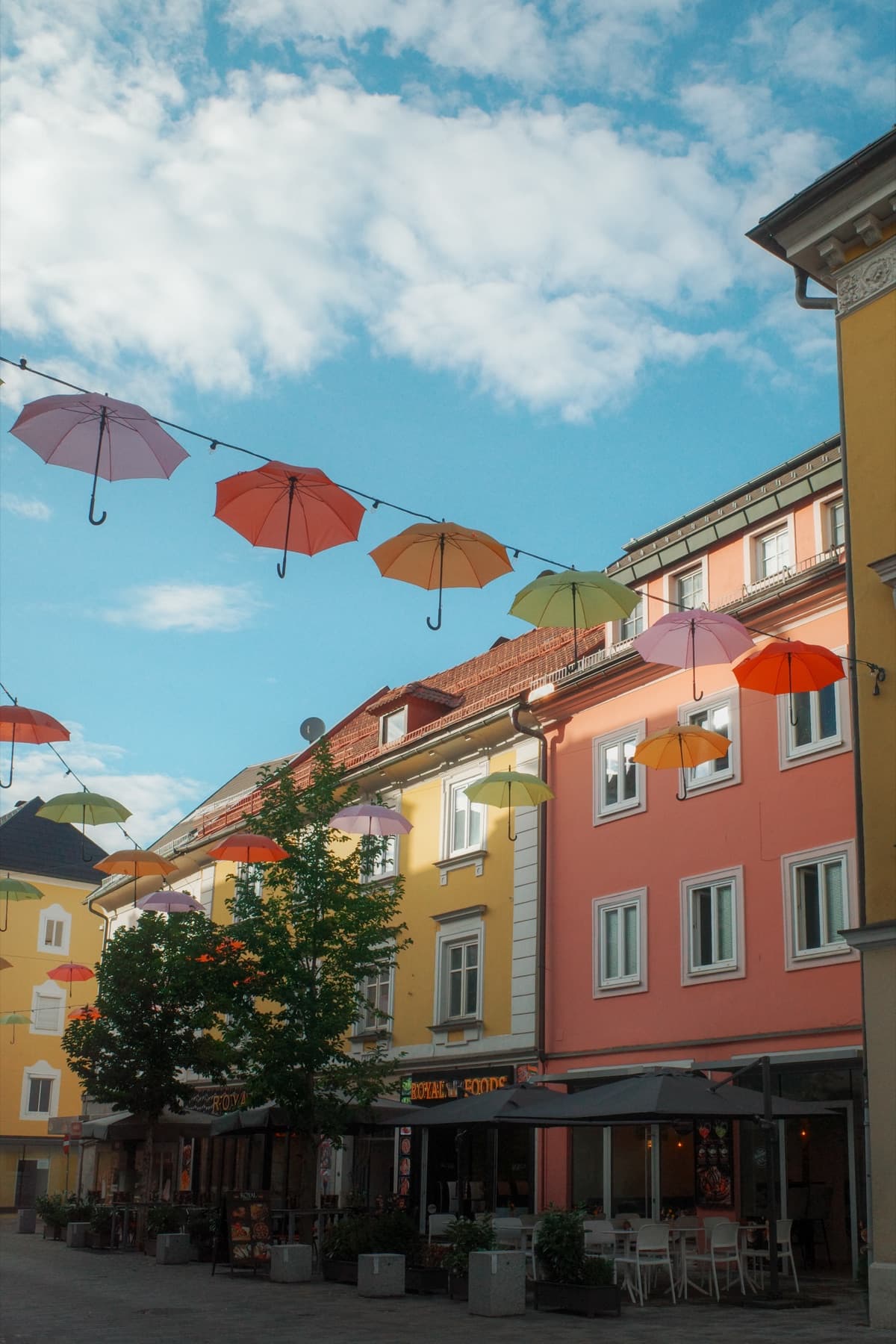 Region Villach, A Carinthian town under its hanging umbrellas, a turquoise lake ten minutes away, and the mist coming down on the mountains in the morning.